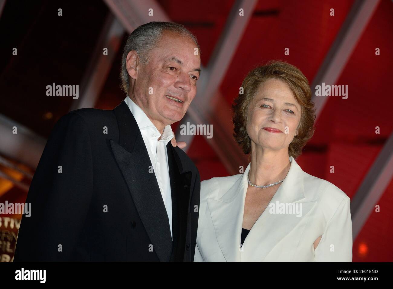 Jean-Noel Tassez and Charlotte Rampling arriving to the screening of the  film A Thousand Times Good Night as part of the 13th Marrakech Film  Festival, Morocco on November 30, 2013. Photo by