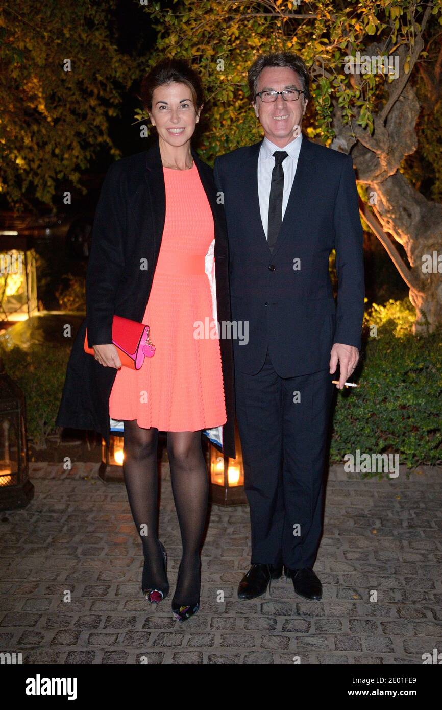 Francois Cluzet and his wife Narjiss arriving for the Dior Party during the 13th Marrakech Film Festival, in Marrakech, Morocco on December 1, 2013. Photo by Nicolas Briquet/ABACAPRESS.COM Stock Photo