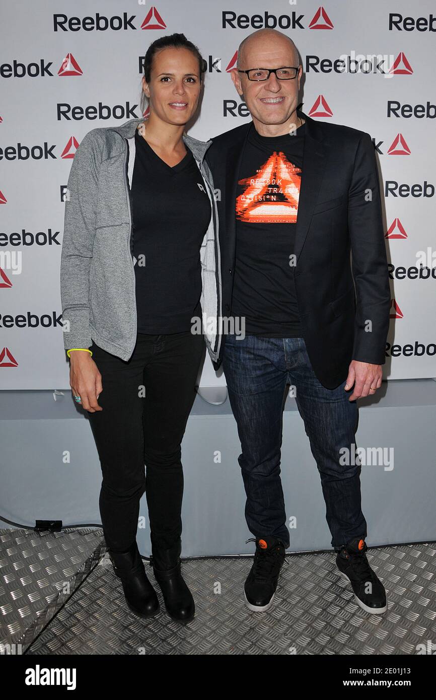 Alain Pourcelot and Laure Manaudou attending the Reebok Concept Store  Opening event at Avenue de L'Opera in Paris, France on December 4, 2013.  Photo by Thierry Plessis/ABACAPRESS.COM Stock Photo - Alamy