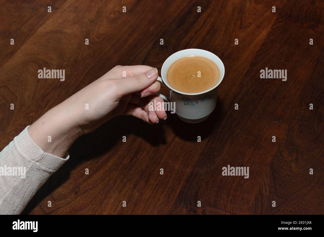 Taking a cup of coffee in the morning Stock Photo