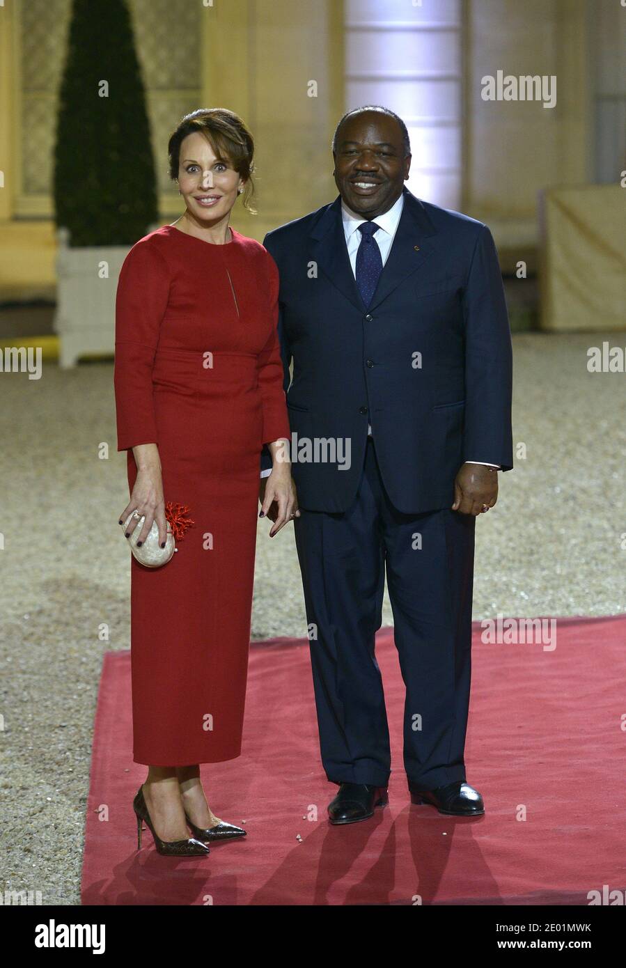 Gabon's president Ali Bongo Ondimba (C) and Gabon's first lady Sylvia Bongo  Ondimba arrive for a dinner with the French President and other dignitaries  as part of the Summit for Peace and