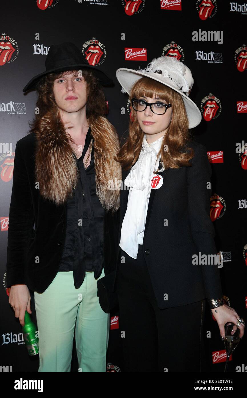 Thomas Baigneres ('Le Spark' music band) and Louise Ebel (Miss Pandora)  attending The Rolling Stones photographs exhibition opening at the Nikki  Diana Marquardt gallery, in Paris, France, on December 12, 2013. Photo