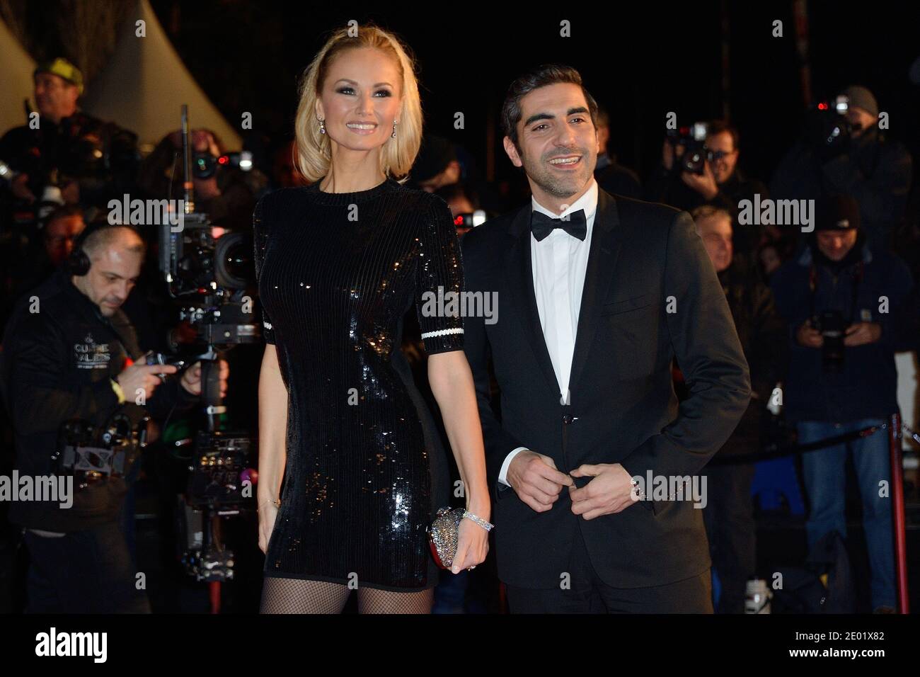 Ary Abittan and Adriana Karembeu attending the 15th NRJ Music Awards held at the Palais des Festivals in Cannes, France on December 14, 2013. Photo by Nicolas Briquet/ABACAPRESS.COM Stock Photo