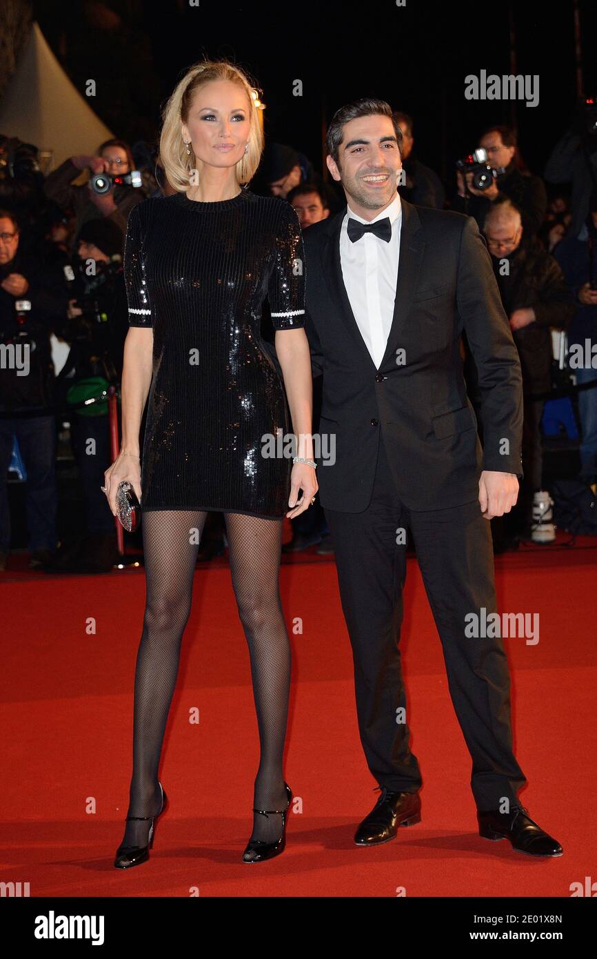 Ary Abittan and Adriana Karembeu attending the 15th NRJ Music Awards held at the Palais des Festivals in Cannes, France on December 14, 2013. Photo by Nicolas Briquet/ABACAPRESS.COM Stock Photo