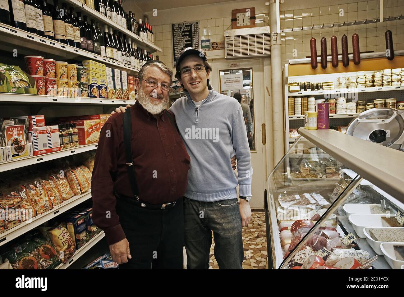FRANCE / IIe-de-France/Paris/ Le Marais/  Jewish Family run business ,Father and his Son posing in Small local Charcutier in Paris Stock Photo