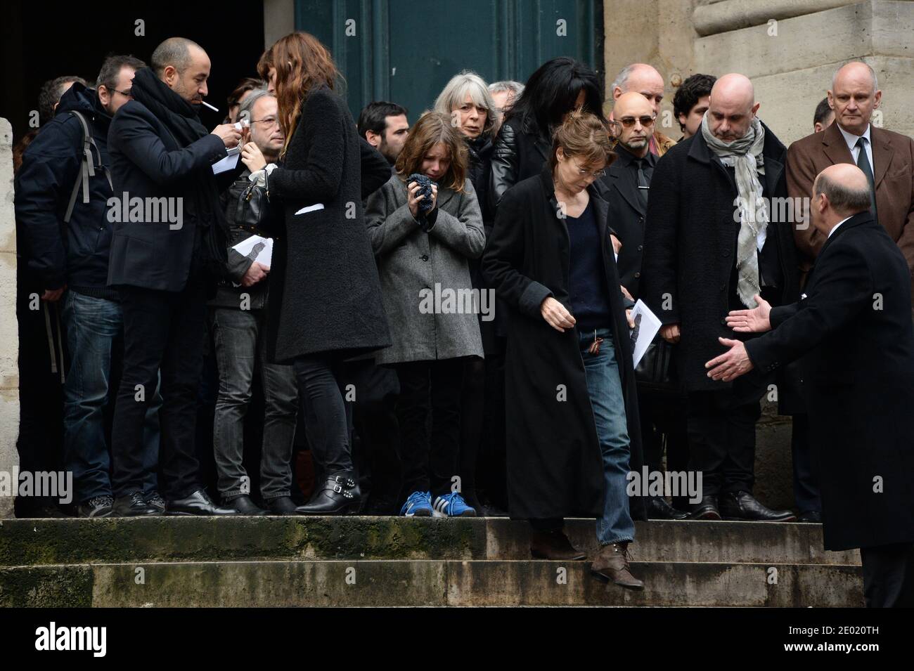Please hide the children's faces prior to the publication Lou Doillon and Jane Birkin attending a tribute mass for Kate Barry held at Saint Roch church in Paris, France on December 19, 2013. Photographer Kate Barry, the daughter of Jane Birkin and John Barry has been found dead on December 11 after falling from the window of her apartment in Paris. She was 46. Photo by ABACAPRESS.COM Stock Photo