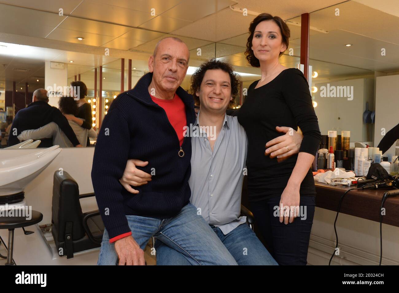 Magician Eric Antoine, flanked by his agent Jean-Pierre Domboy and his wife  Calista, at the taping of Vivement Dimanche on December 18, 2013 in Paris,  France. Photo by Max Colin/ABACAPRESS.COM Stock Photo -
