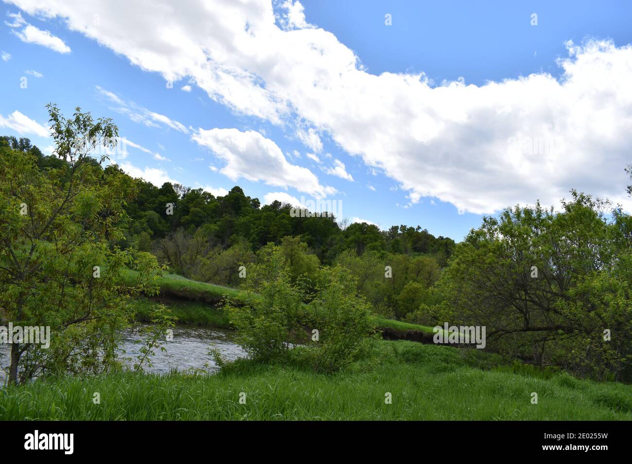 Blue sky over the river Stock Photo