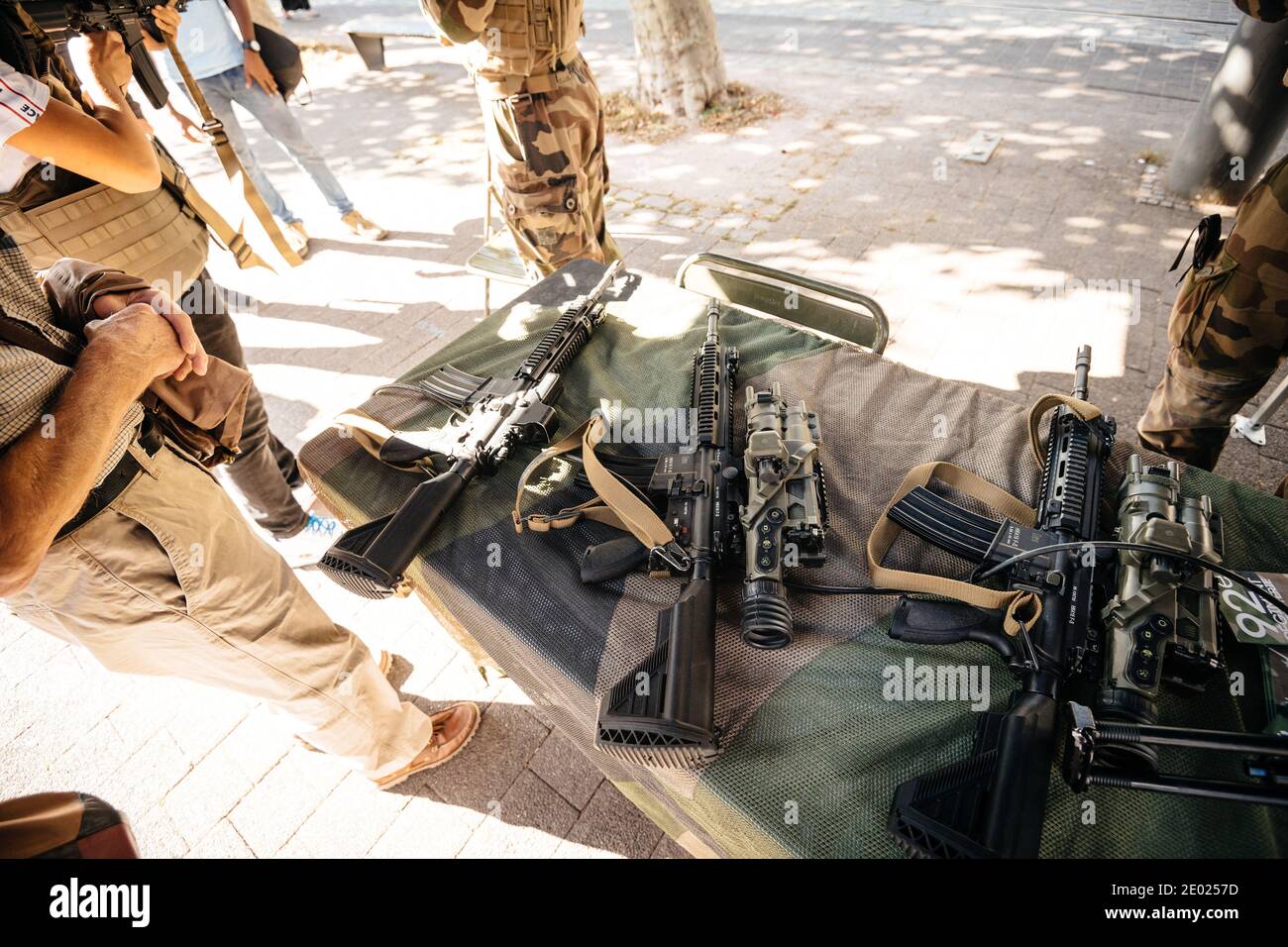 Strasbourg, France - Sep 21, 2019: Presentation of multiple Heckler and Koch HK416 assault rifle designed and manufactured by the German company with Stock Photo