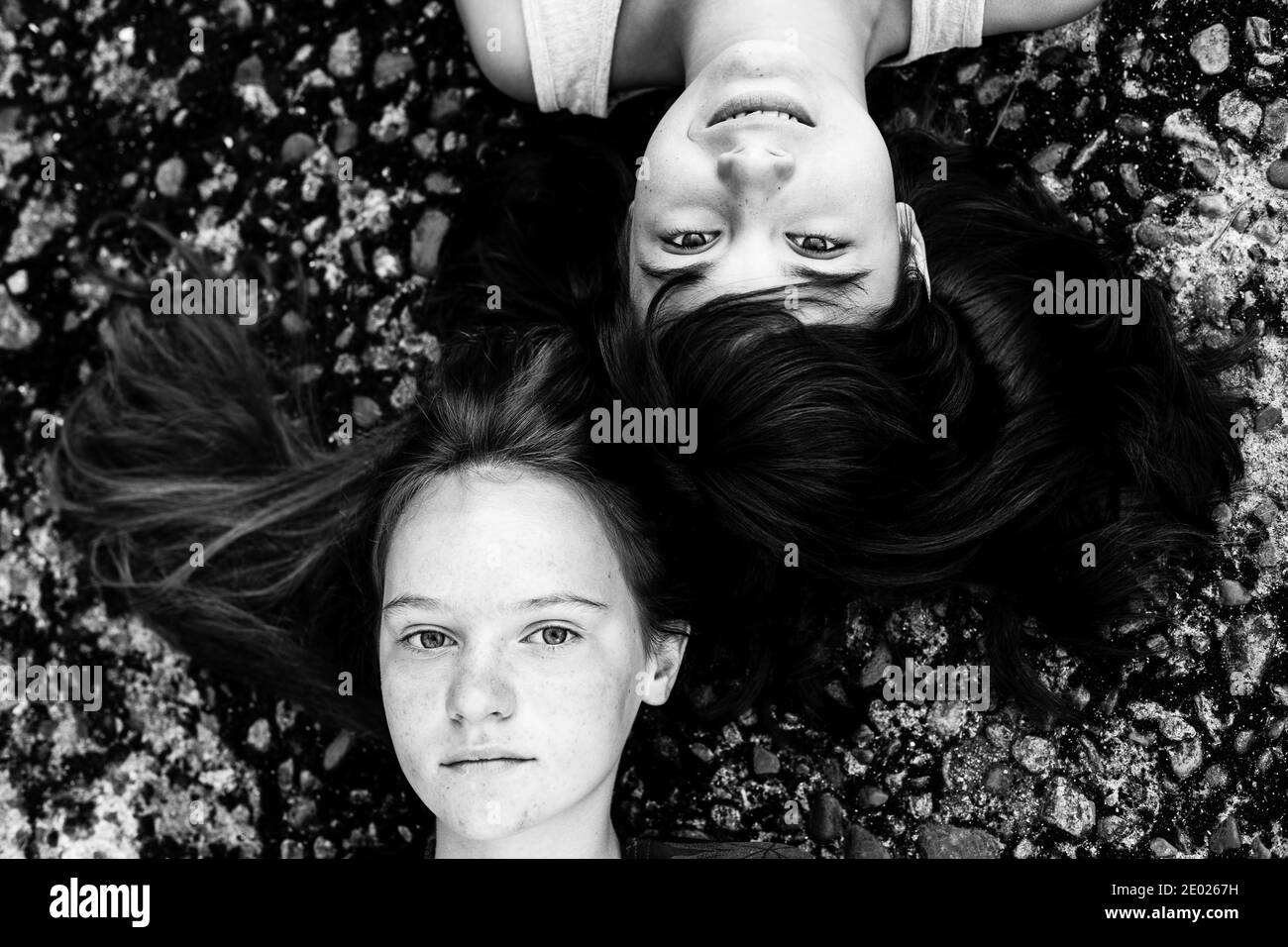 Two women posing photo Black and White Stock Photos & Images - Alamy
