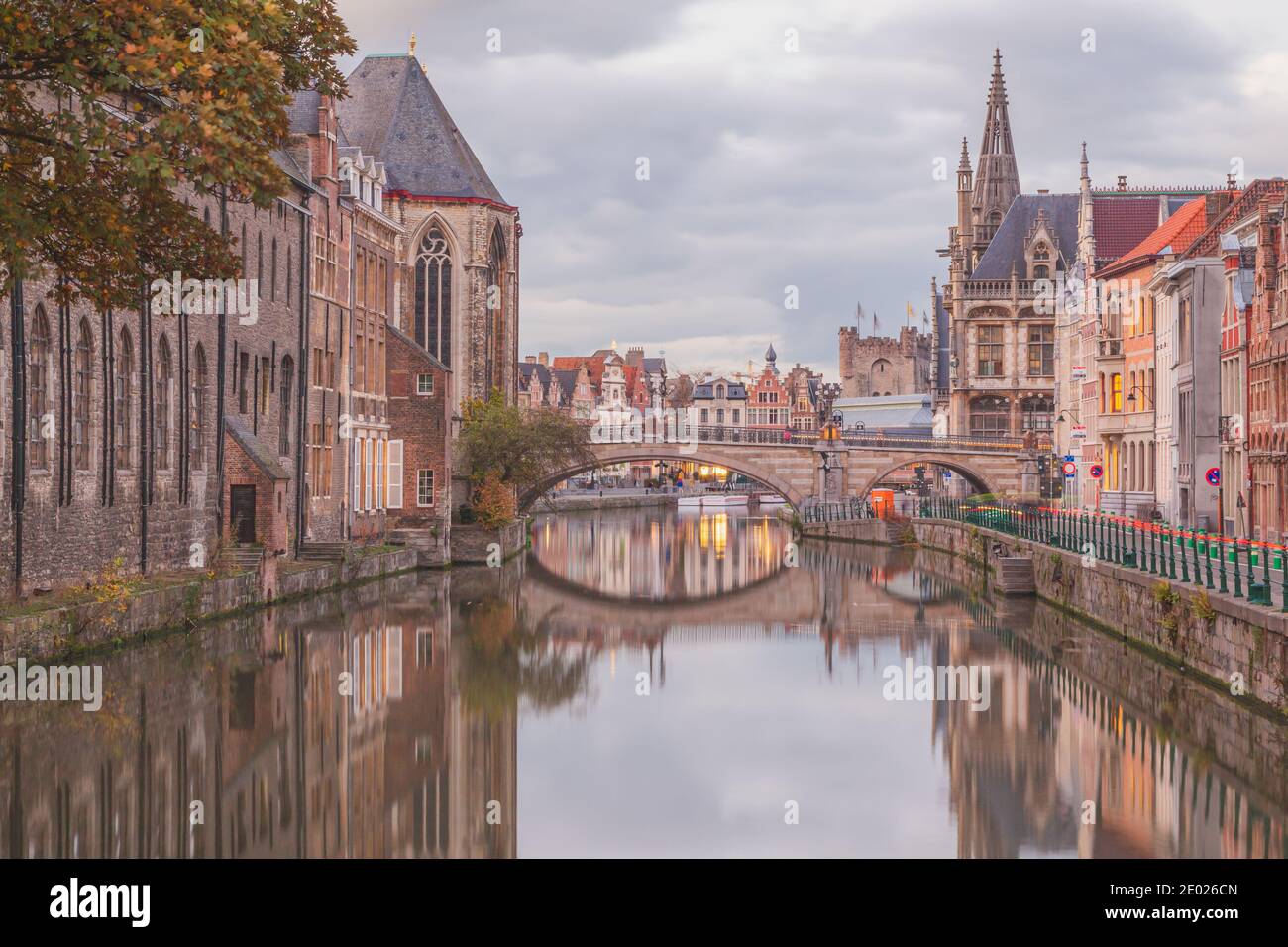 Ghent, Belgium - November 13 2014: The beautiful historic old town of Ghent, Belgium along the Leie Canal at dusk. Stock Photo