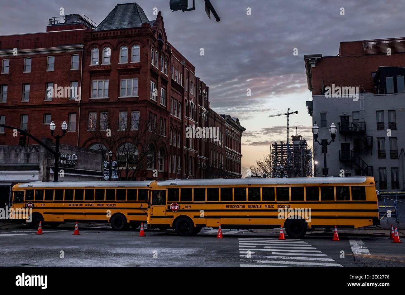Nashville, Tennessee, USA. 28th Dec, 2020. Metro Nashville Public School busses are used to block the view down Second Avenue from Union Street Monday, December 28, 2020 following the Christmas morning explosion. Nashville, Tennessee, USA. 28th Dec, 2020. Metro Nashville Public School busses are used to block the view down Second Avenue from Union Street Monday, December 28, 2020 following the Christmas morning explosion.