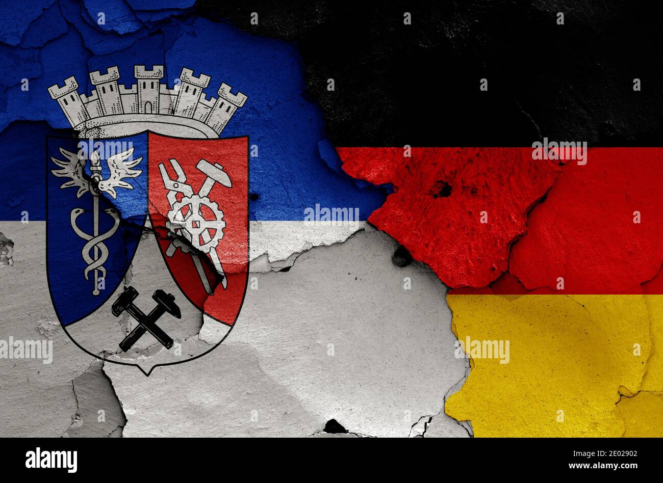 flags of Oberhausen and Germany painted on cracked wall Stock Photo