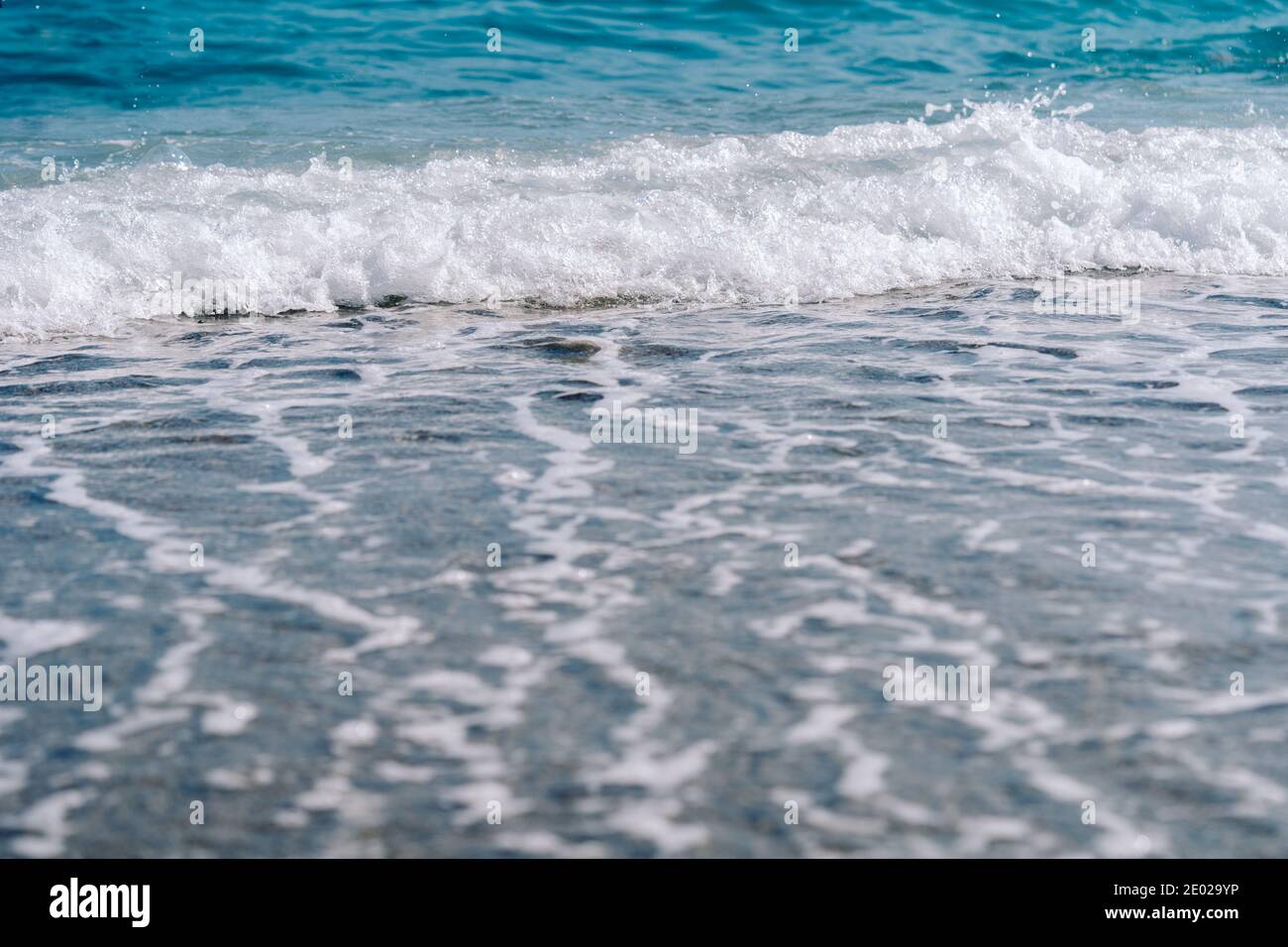 Beautiful foamy waves on beach hi-res stock photography and images - Alamy