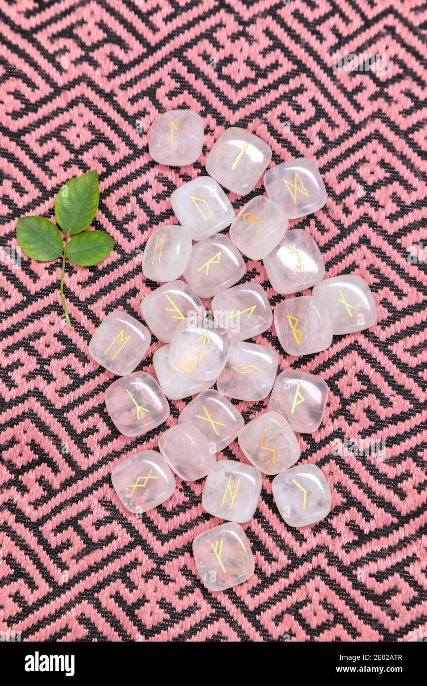 Rose quartz runes set Stock Photo - Alamy