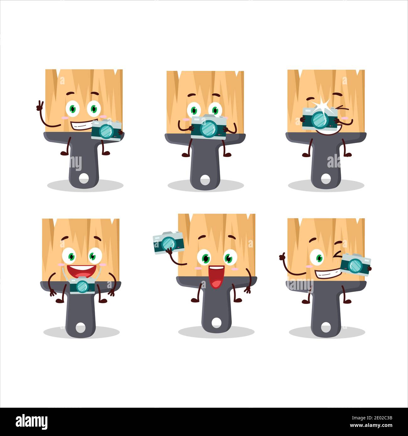 Photographer profession emoticon with paint brushes cartoon character. Vector illustration Stock