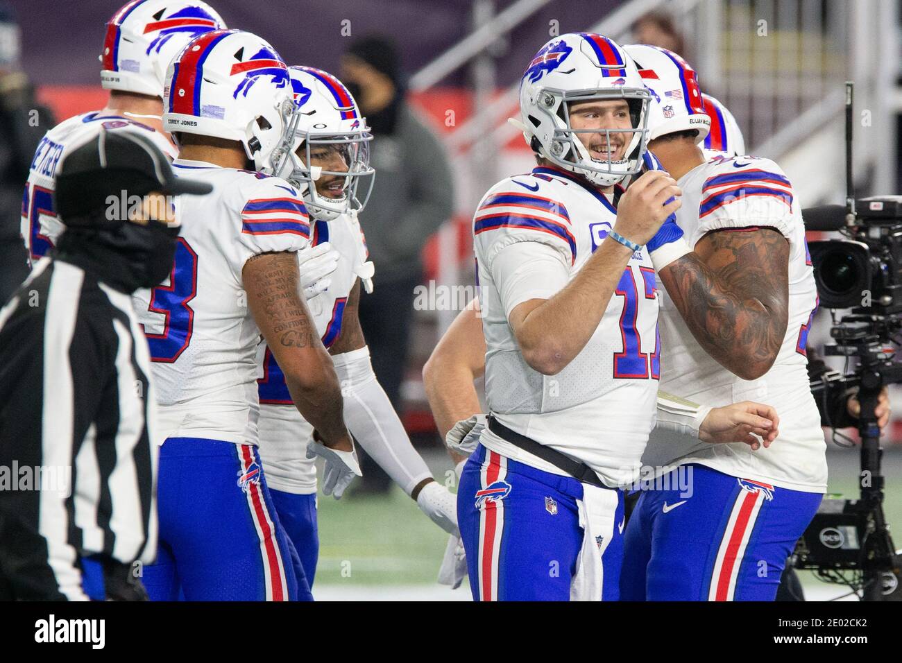 New England Patriots wide receiver Josh Gordon (10) gets a hug from  quarterback Tom Brady after the two connected for a touchdown reception in  the third quarter against the Minnesota Vikings at