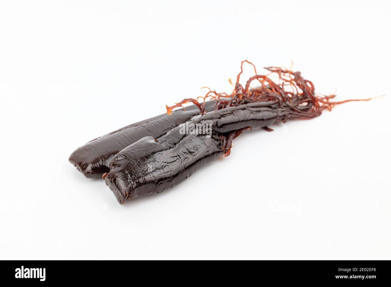 Red ginseng on white background Stock Photo