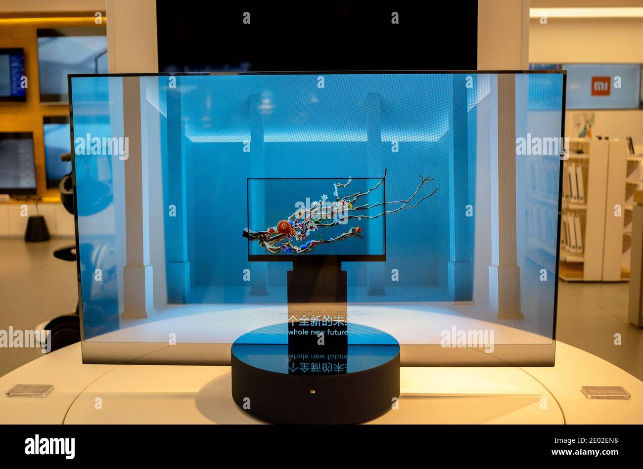 A conceptual transparent screen TV is exhibited in a Xiaomi store ( also called  MI shop Stock Photo - Alamy