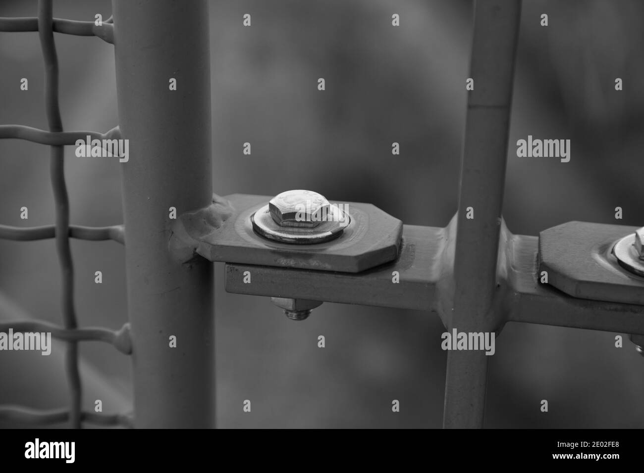 screws on a metal railing Stock Photo - Alamy