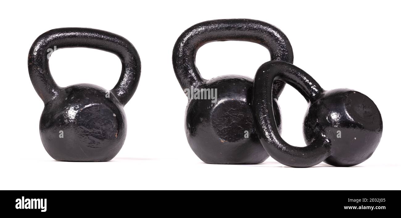 Black kettlebells isolated on a white background Stock Photo - Alamy