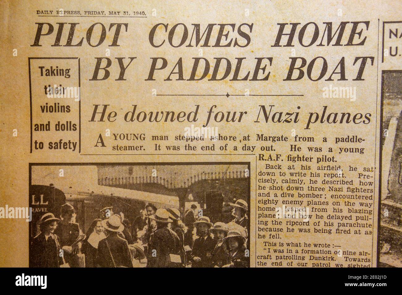 Article of RAF pilot covering Dunkirk being rescued after crashing in the English Channel, Daily Express newspaper (replica) on 31st May 1940. Stock Photo