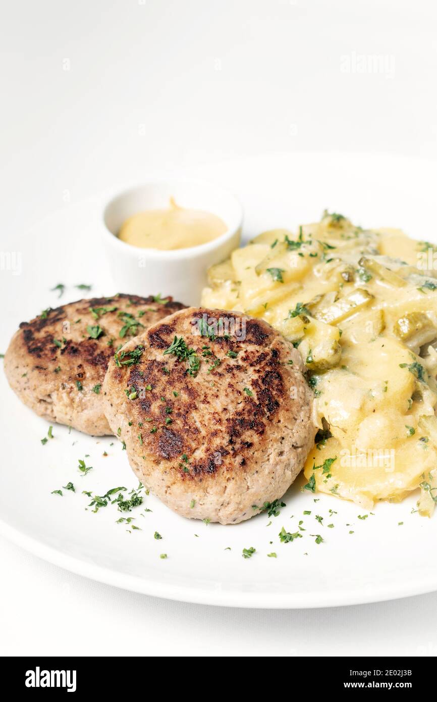 german frikadellen meatballs with creamy onion fried potatoes and