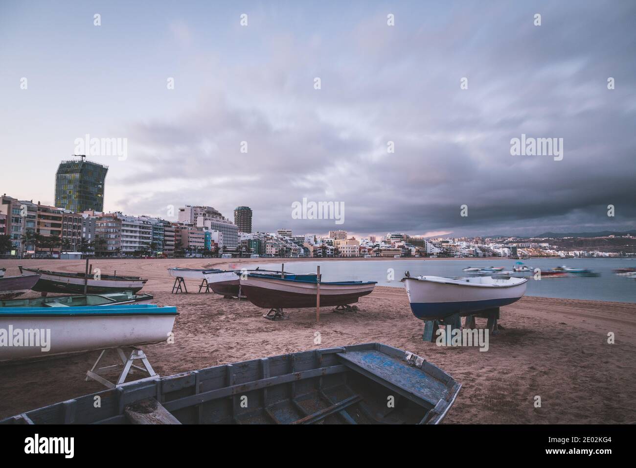 Sunrise on Las Canteras beach in Las Palmas de Gran Canaria, Canary islands,Spain, one of the most beautiful city-beaches in Spain. Long exposure. Stock Photo