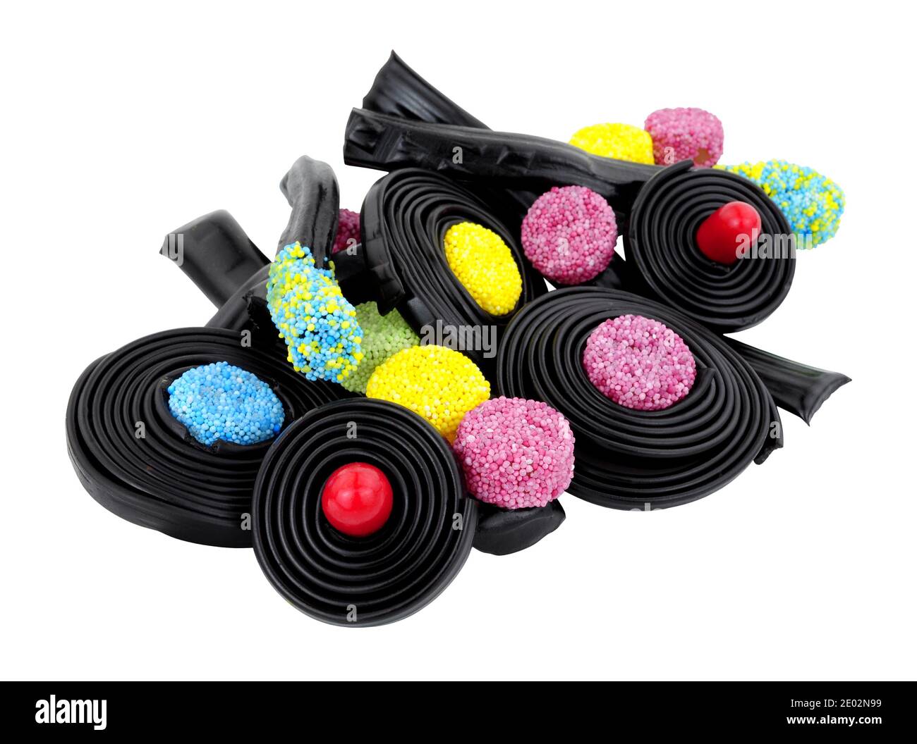 Group of novelty liquorice sweets including Catherine wheels, spinning tops and traffic lights isolated on a white background Stock Photo