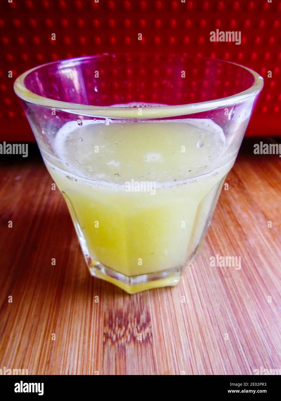 A glass of fresh Lemon Juice Stock Photo Alamy