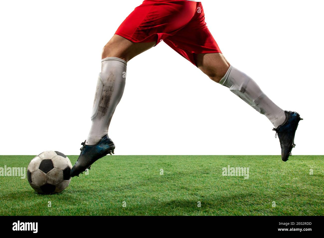 Close up legs of professional soccer, football player fighting for ball on  field isolated on white background. Concept of action, motion, high  tensioned emotion during game. Cropped image Stock Photo - Alamy
