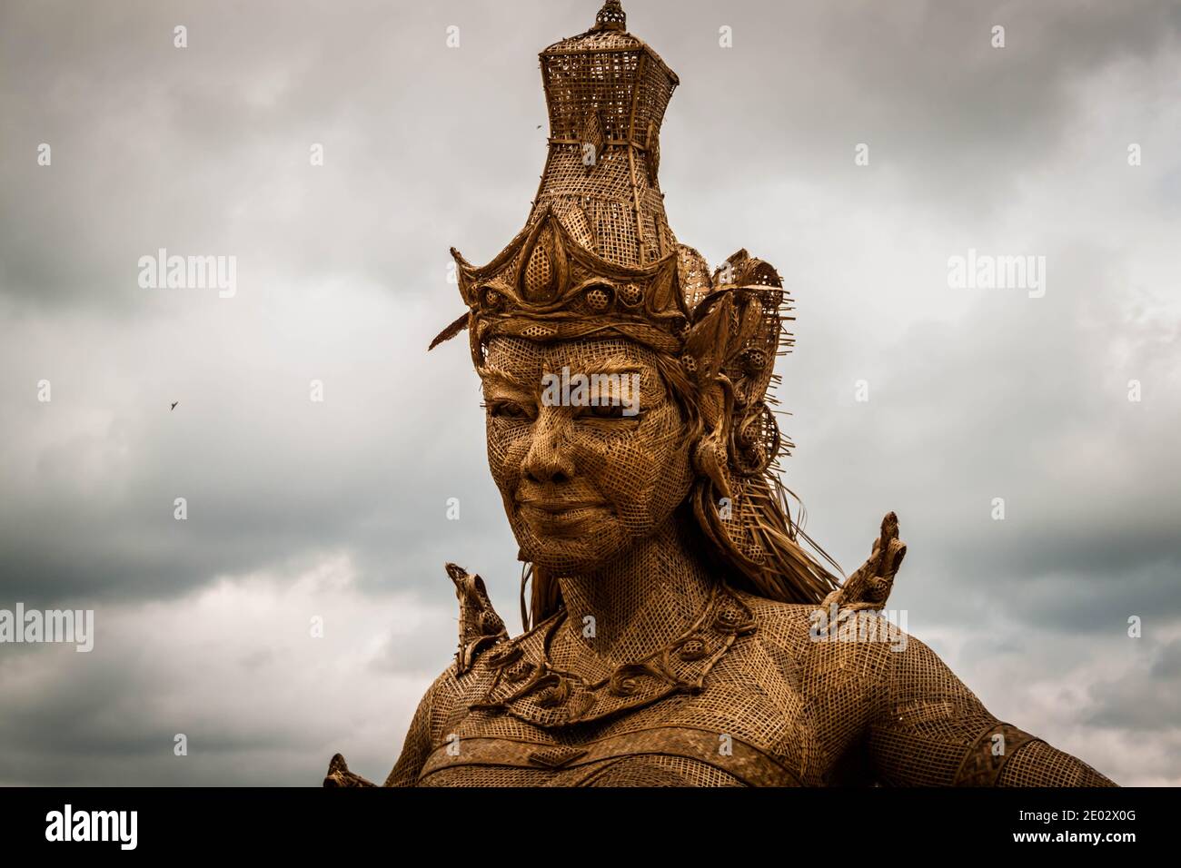 A close up image of the statue of Dewi Sri (The goddess of rice and fertility) at Jatiluwih Rice Terrace in Bali Stock Photo