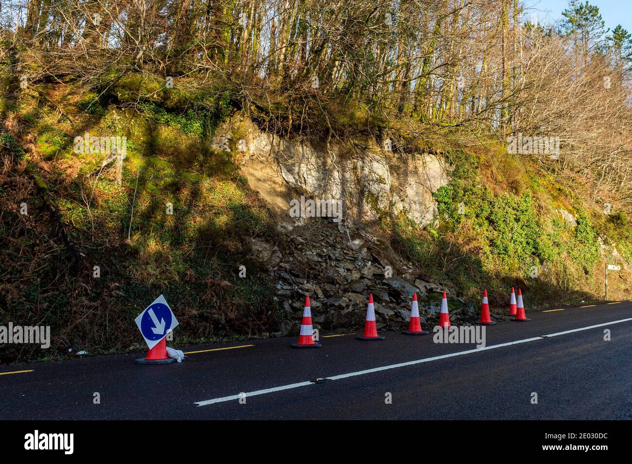 Gloundha, West Cork, Ireland. 29th Dec, 2020. Due to recent torrential rain, a small landslide occurred overnight on the R586 at Gloundha, between Drimoleague and Dunmanway. The county council have placed traffic cones around the hazard. Credit: AG News/Alamy Live News Stock Photo