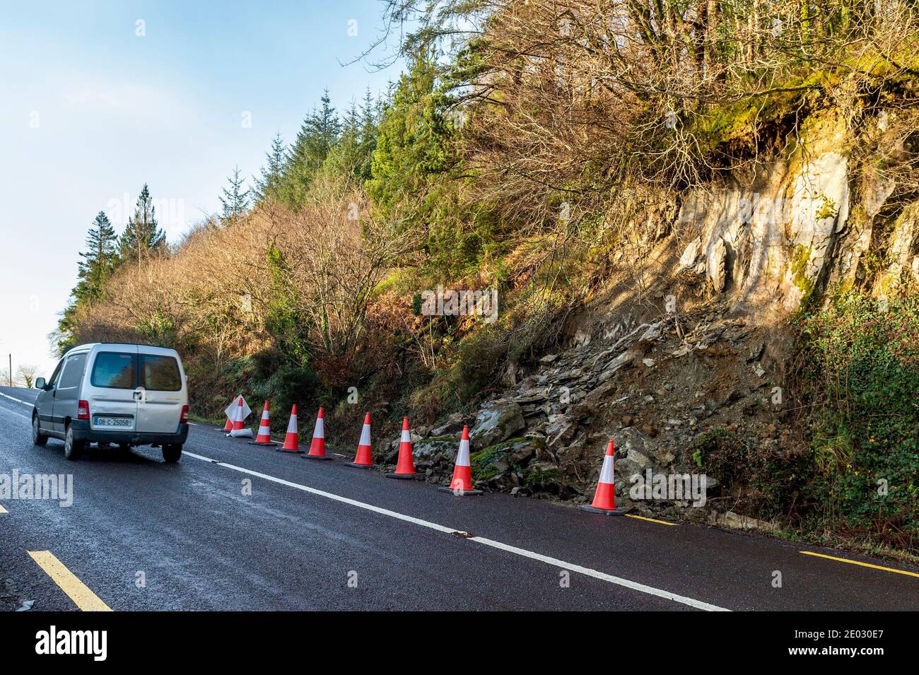 Gloundha, West Cork, Ireland. 29th Dec, 2020. Due to recent torrential rain, a small landslide occurred overnight on the R586 at Gloundha, between Drimoleague and Dunmanway. The county council have placed traffic cones around the hazard. Credit: AG News/Alamy Live News Stock Photo