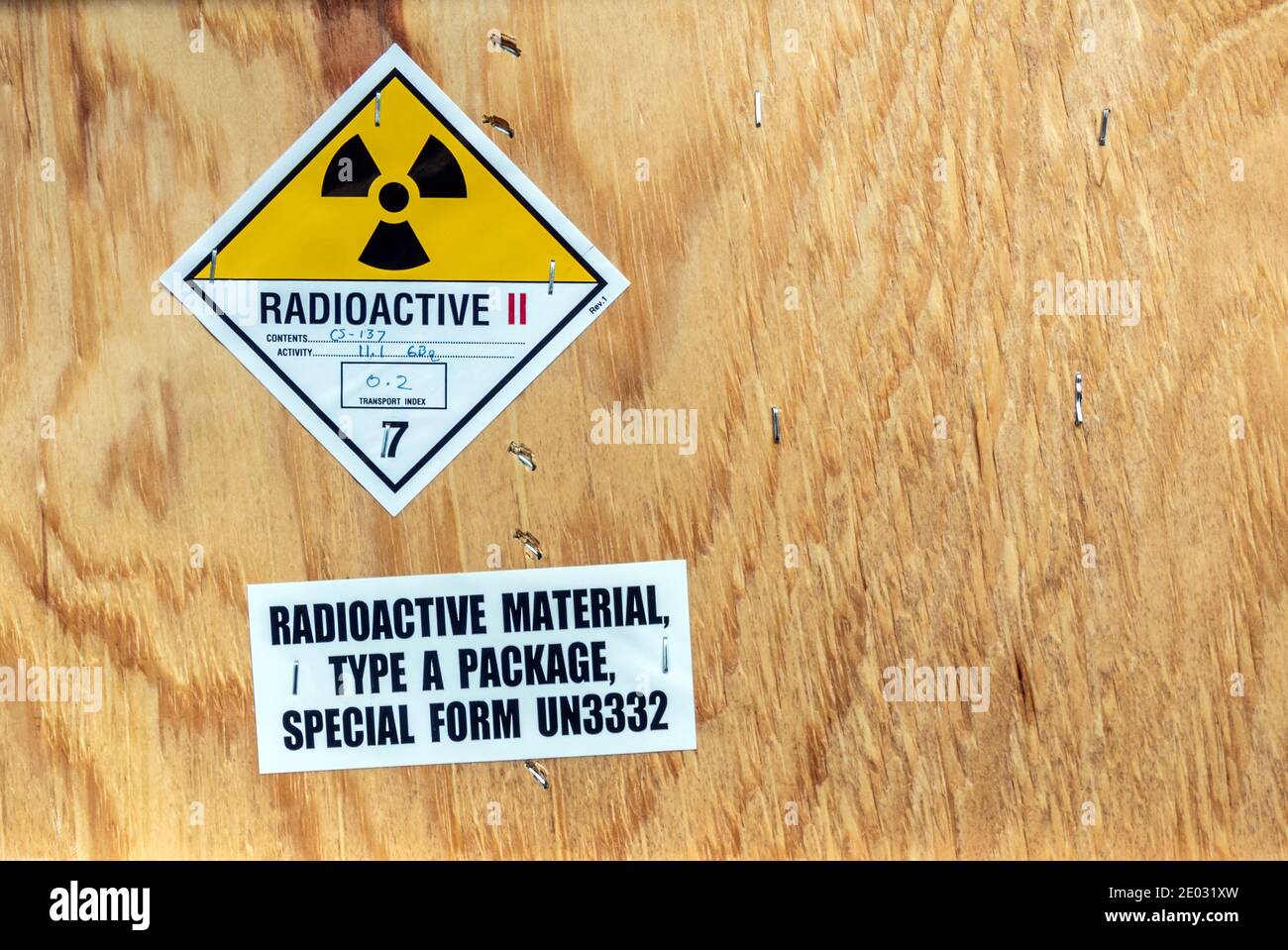 The radioactive material label beside the transportation wooden box