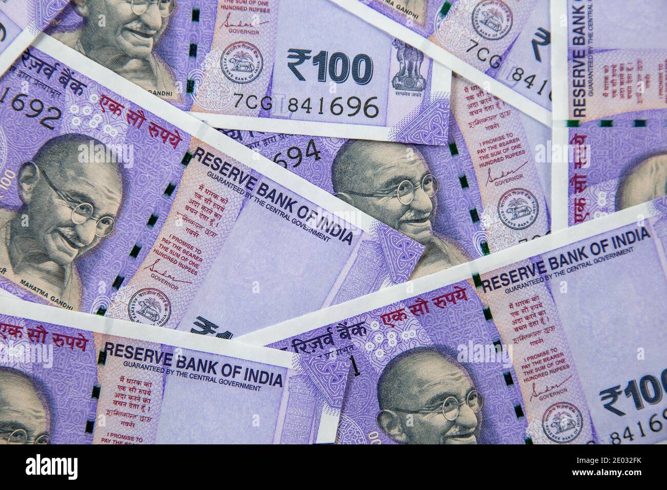 one hundred rupees bank note - India currency background Stock Photo