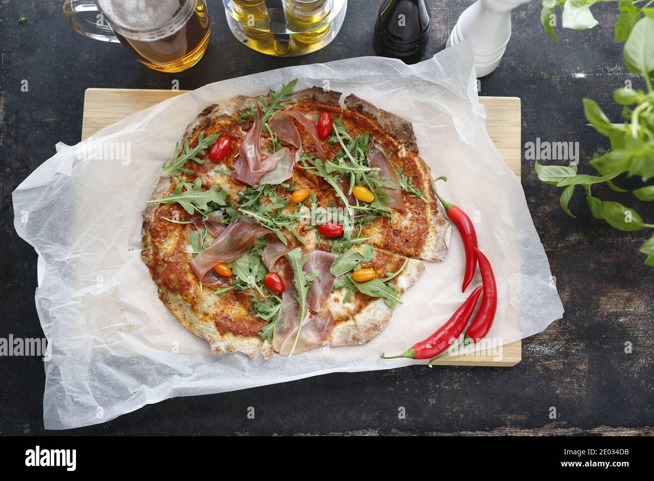 Italian pizza with ham. Traditional Italian pizza with Parma ham
