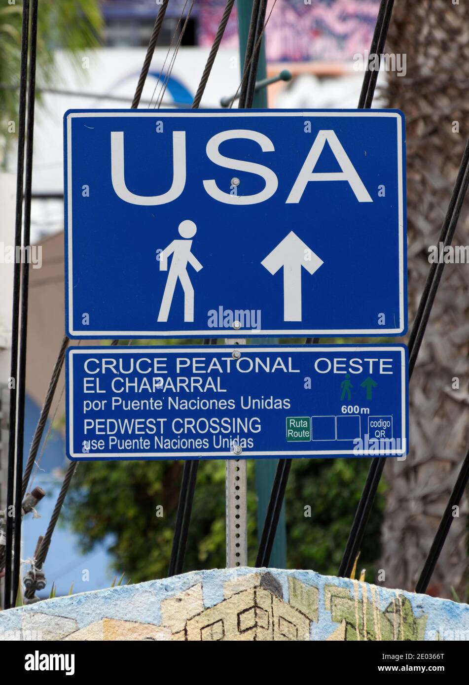 Tijuana, Mexico - October 20, 2017: Signage indicating location of border crossing for pedestrians from Mexico to USA Stock Photo