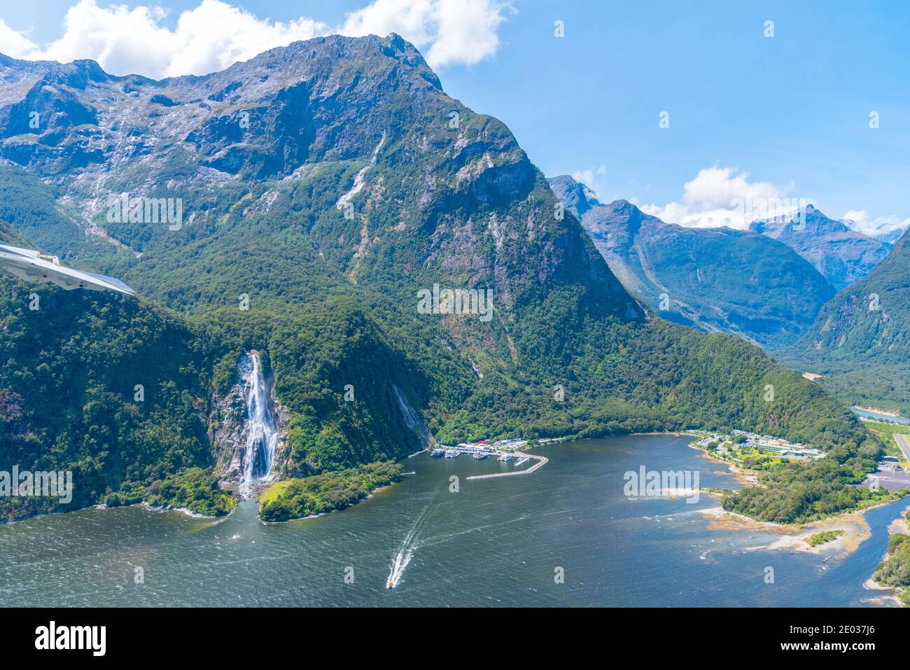 waterfall valley new zealand steep torrent group mountain blue