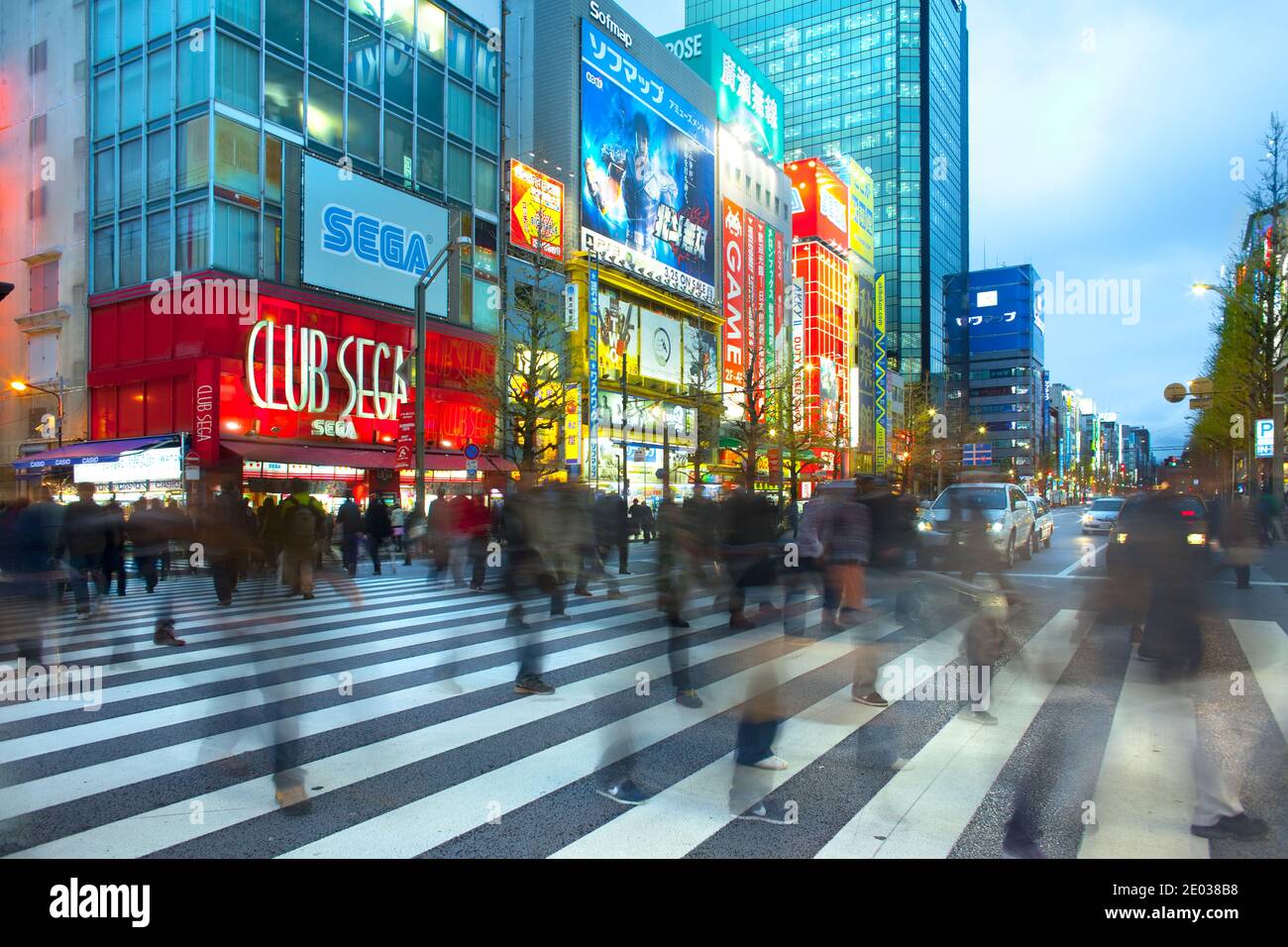 Akihabara Electric Town, Tokyo, Kanto Region, Honshu, Japan - Motion blur of people at a street crossing in the bustling district of Stock Photo