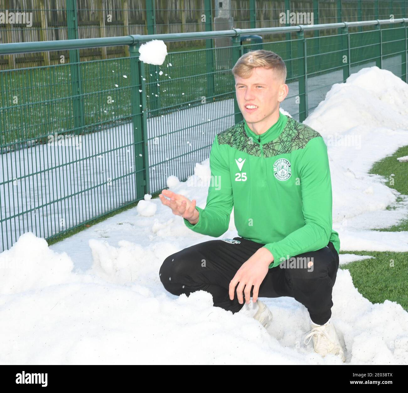 Tranent, Ormiston, East Lothian.Scotland. UK 29th Dec-20 Hibernian youngster Josh Doig has fun in the snow after training session for Scottish Premiership match with Ross County Credit: eric mccowat/Alamy Live News Stock Photo