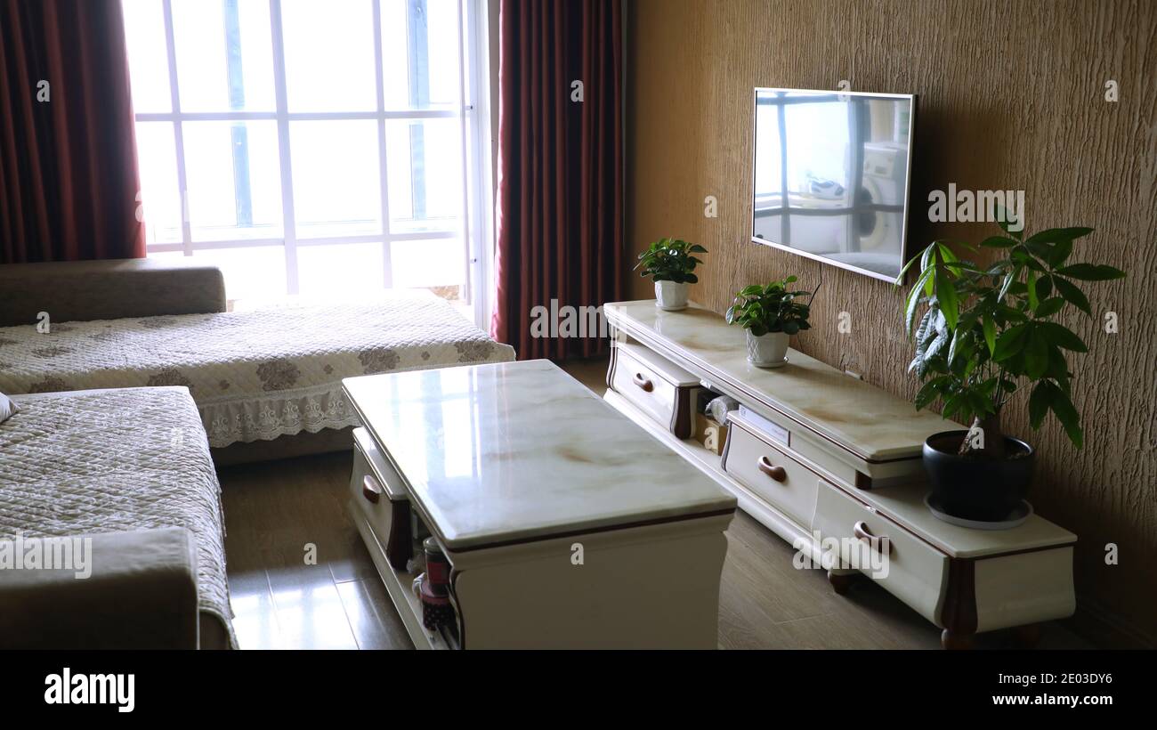 Modern interior furniture in living room with cozy sofas and