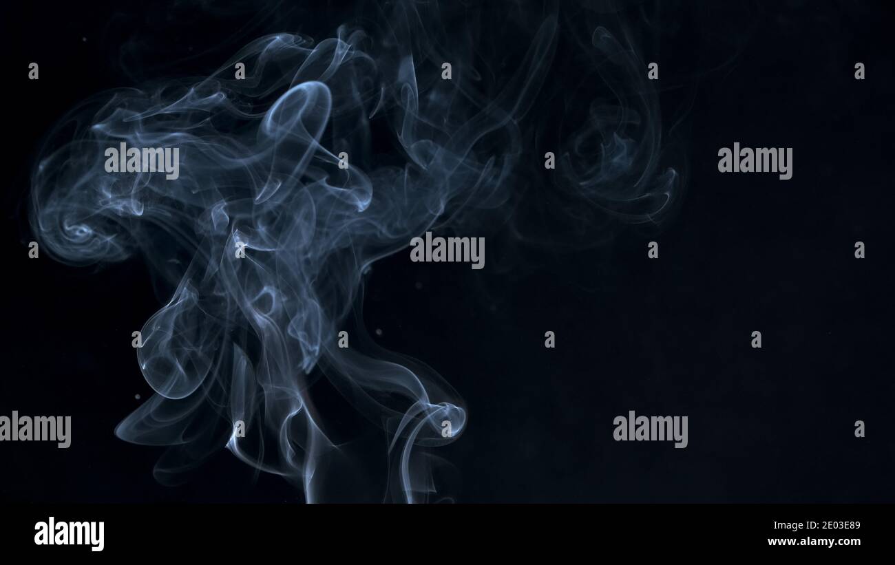 Blue and white smoke on black background, cigarette smoke element Stock