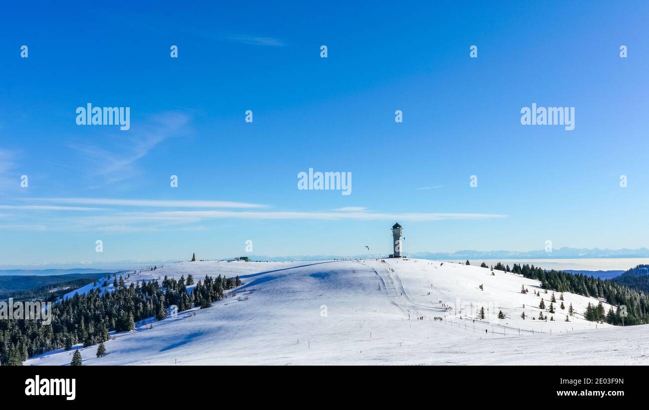 Winter Feldberg Ski Resort in Black Forest of German, tower at rear of treeless area Stock Photo