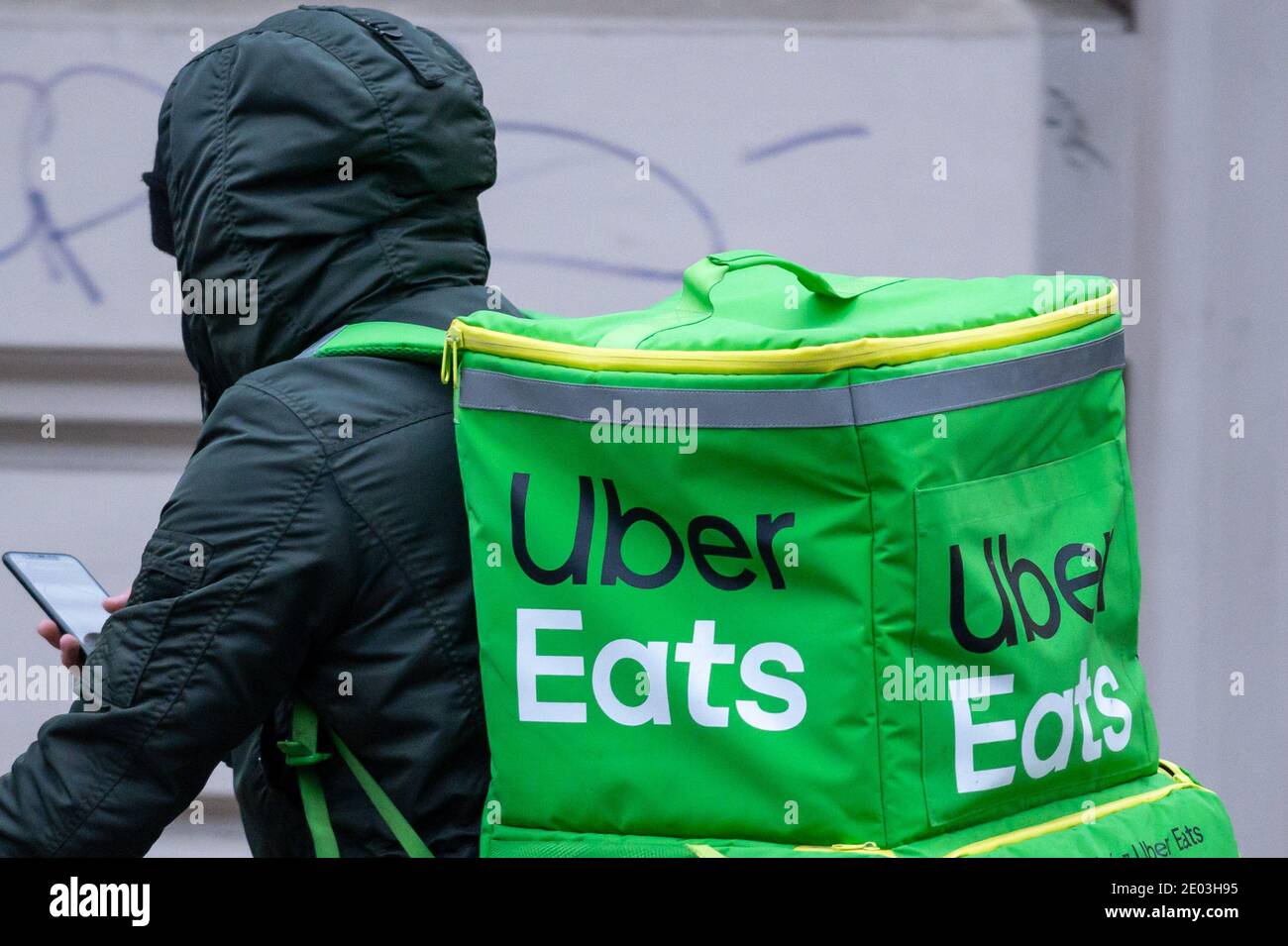 An Uber eats rider at work in Kraków, Poland Stock Photo - Alamy
