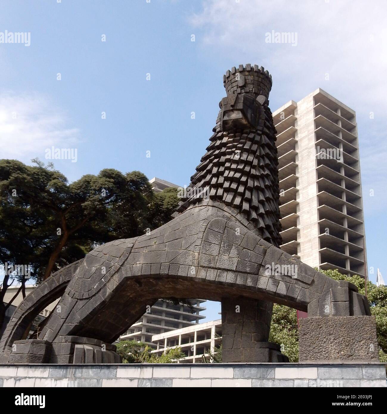英10” Disciples (2) Prowling Lion / Return To Addis Ababa TOP001 Topatop /00200 Black Lion Sculpture Addis Ababa Ethiopia Stock Photo
