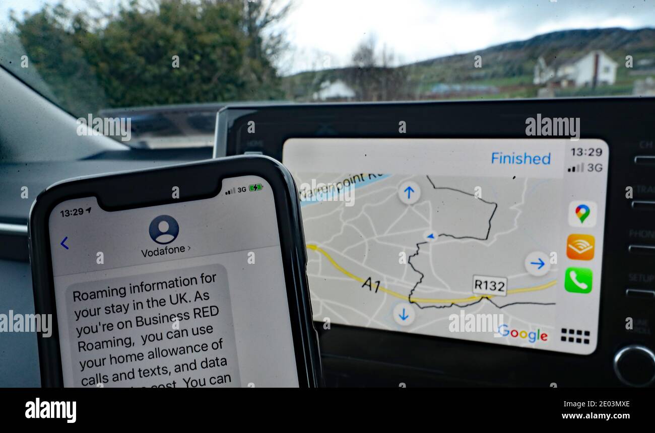 A stock picture of mobile phone roaming information on the border between Northern Ireland and the Republic of Ireland. Stock Photo