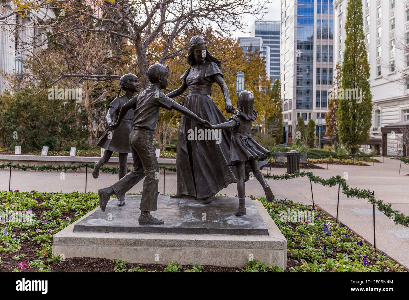 Bronze sculpture of a mother with her children located in Temple Square, downtown Salt Lake city, Utah. Stock Photo