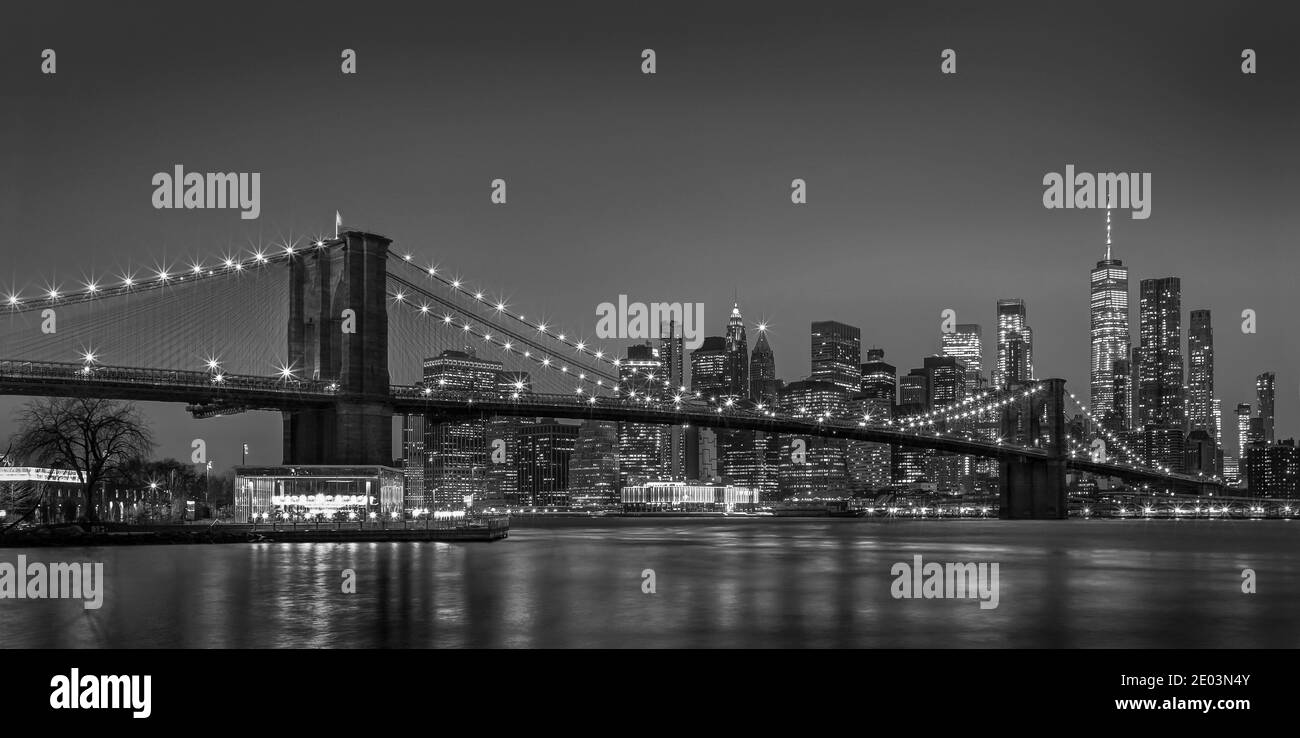 Famous view from Brooklyn over the Brooklyn Bridge and the skyline of Lower Manhattan. Stock Photo