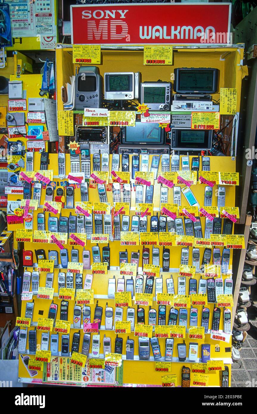 Wall of phones for sale, Akihabara electronics district, Tokyo, Japan, May 1998 Stock Photo